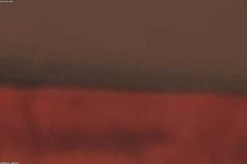 Person carefully checking a detail, symbol of compulsive behaviors in OCD